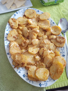 Una foto de Papas al ajillo pastor