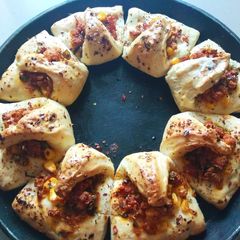A picture of Paneer Bhurji Desi Pizza bite.