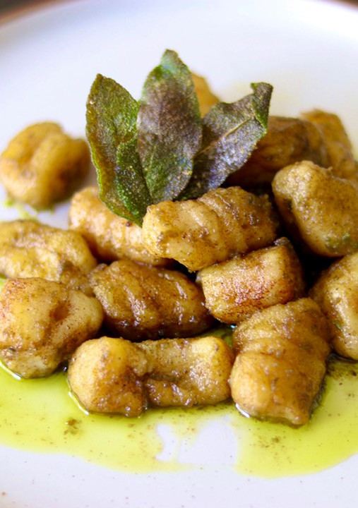 A picture of Potato and parsnip gnocchi with green pesto and crispy sage 🌿.