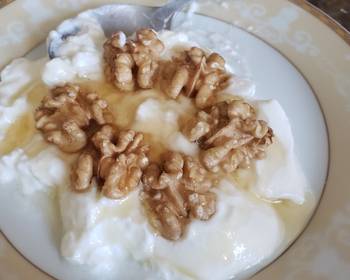 Unique Cuisine Yogurt with honey and pecan  Savory Delicious