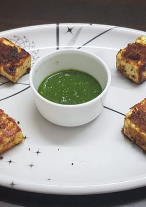 A picture of Paneer tikka popsicles.