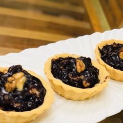 A picture of Dates and Walnut Pie.