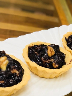 A picture of Dates and Walnut Pie.