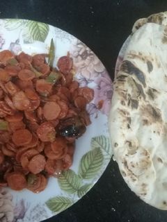 صورة لوصفة 🍅🌶️ روست السجق على أصوله 🍽️👏