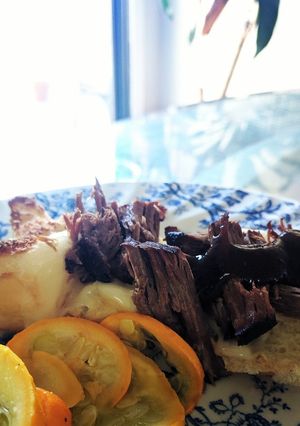 A picture of Roast beef and Swiss sliders.