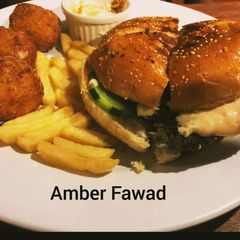 A picture of Mutton shami kabab burger with plain yoghurt and fry potato 😋😋.