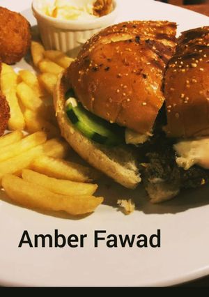 A picture of Mutton shami kabab burger with plain yoghurt and fry potato 😋😋.