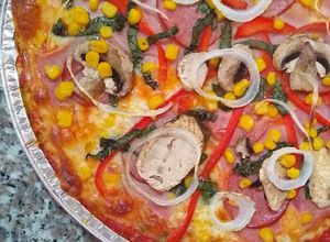 Una foto de Pizza con masa de Coliflor