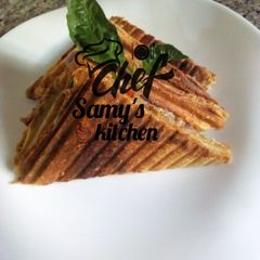 A picture of Egg and sardine sandwich.
