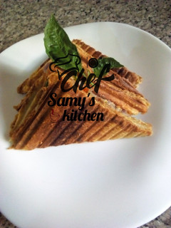 A picture of Egg and sardine sandwich.