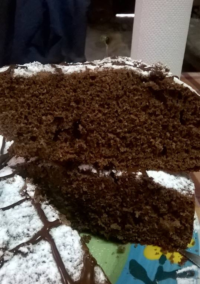 Una foto de Torta de chocolate con postre de cajita