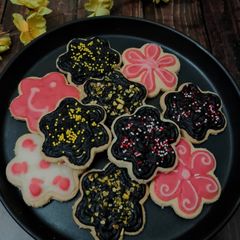 A picture of Chocolate ganache topped cookies.
