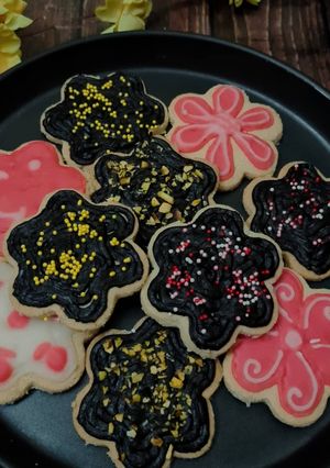 A picture of Chocolate ganache topped cookies.