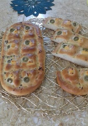 Une photo de Pain aux olives et fromage