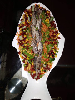A picture of Fish salad.
