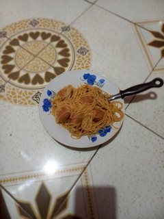 A picture of Spaghetti with smokies.