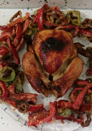 Una foto de Pollo asado con anís y pimientos fritos con tempura
