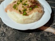 Una foto de solomillo de cerdo con puré