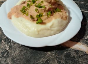 Una foto de Solomillo de cerdo a la crema con puré