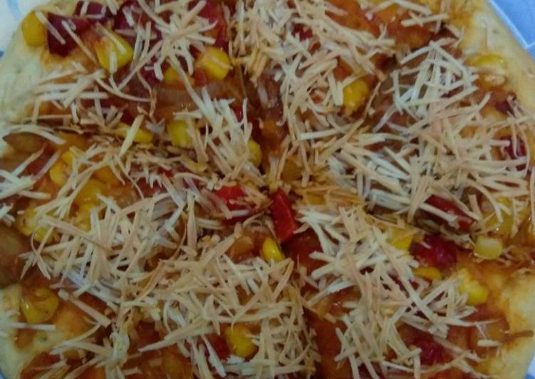 Topping pizza: bakso kornet jagung
