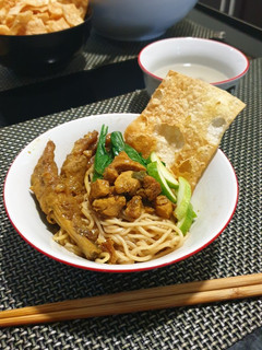 A picture of Chicken Noodles + Chicken Feet: Indonesian Street Style.