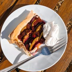 A picture of Apple and plum filo tart.