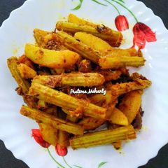 A picture of Drumstick Masala Fry.