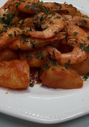 Una foto de Langostinos al "all cremat"