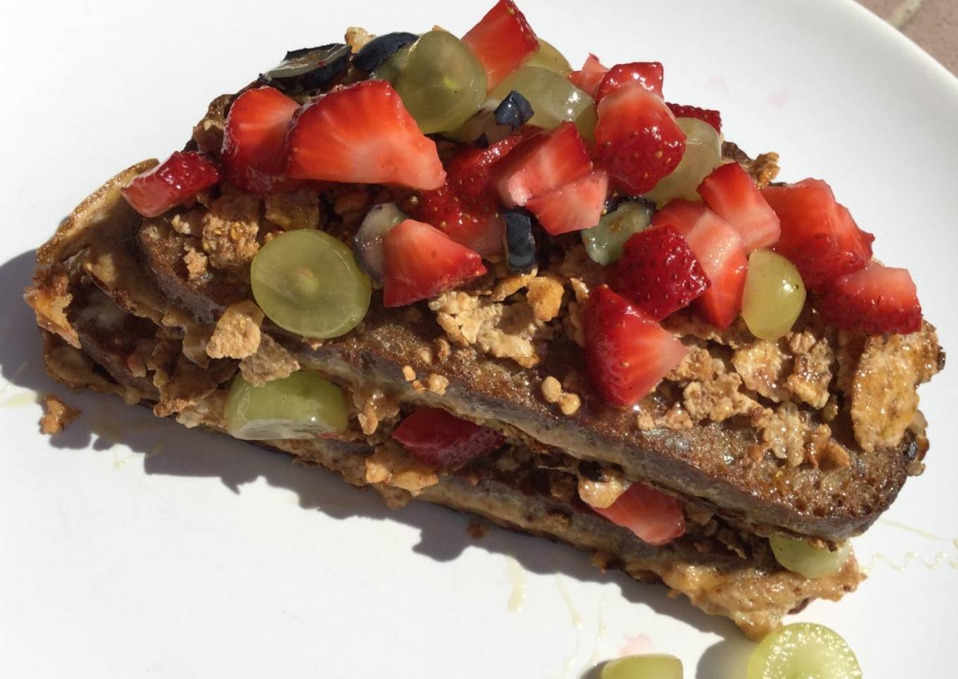 Breakfast amazingness😋 French toast with cereals and fresh fruits🍓🍇