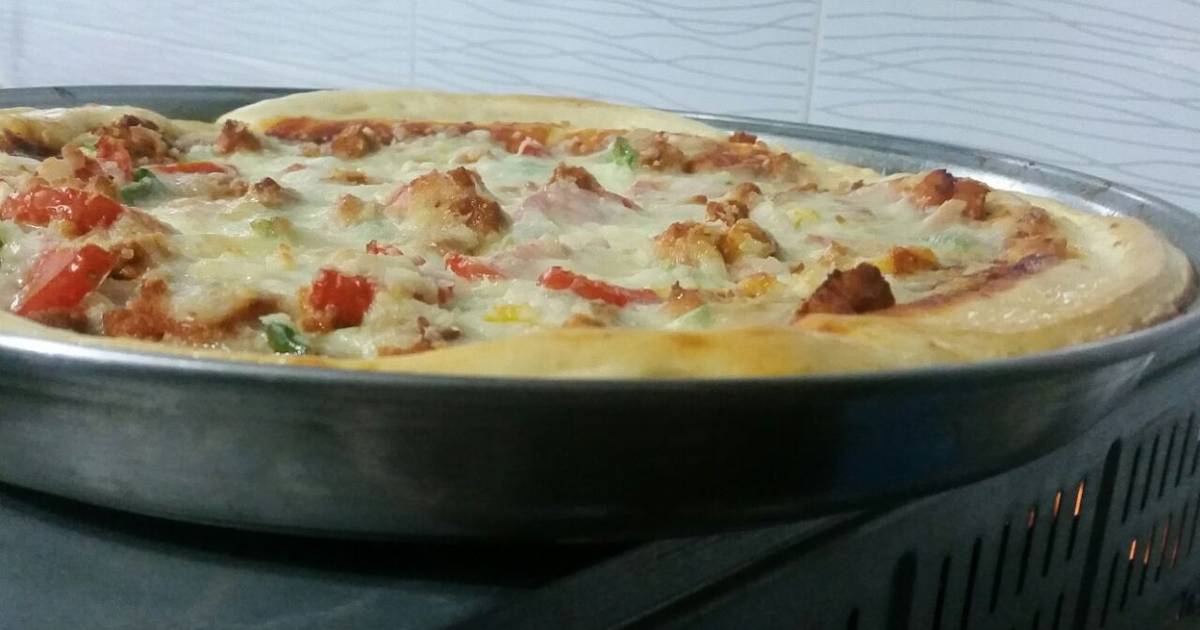 Chicken Tikka Pizza Recipe By Sadaf Salman Cookpad