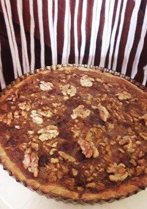 Una foto de Tarta Especiada de nueces y dátiles