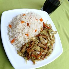 A picture of White rice and cabbage stir fry.