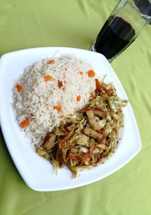 A picture of White rice and cabbage stir fry.