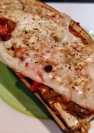 Una foto de Berenjena rellena de verduras