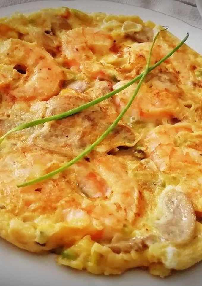 Una foto de Tortilla de Champiñones con Langostinos