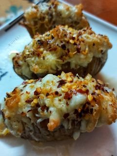 পটেটো হ্যাজেলব্যাক (potato hasselback recipe in Bengali) রেসিপির প্রধান ছবি