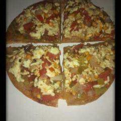 A picture of Roti Sweet Corn Pizza.