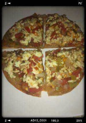 A picture of Roti Sweet Corn Pizza.
