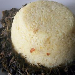 Freshly grated Turmeric rice A picture of Freshly grated Turmeric rice.