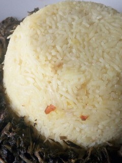 A picture of Freshly grated Turmeric rice.