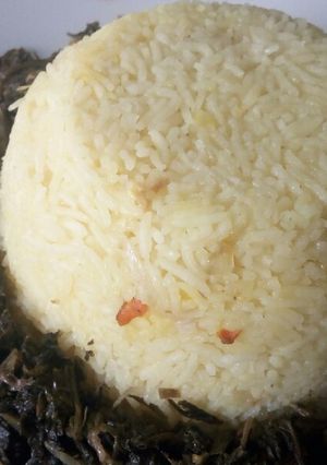 A picture of Freshly grated Turmeric rice.