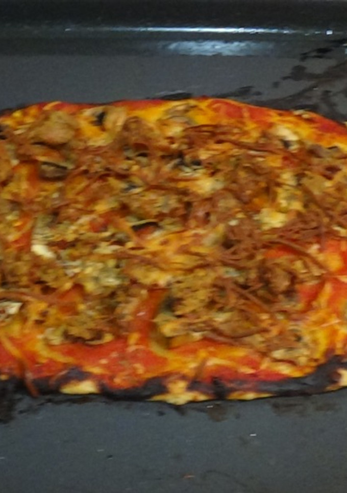 Una foto de Pizza de atún y champiñón