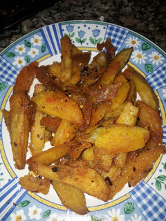 Una foto de Papas bravas