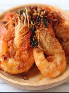 A picture of Roasted King prawns with crispy chilli and garlic Thai style 🦐.