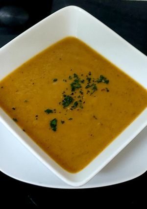A picture of My Carrot,Sweet Potato&Aubergine Soup with Roots,leaves,Stems🤩.