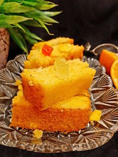 एगलेस ऑरेंज केक (eggless orange cake recipe in Hindi) रेसिपी मुख्य फोटो