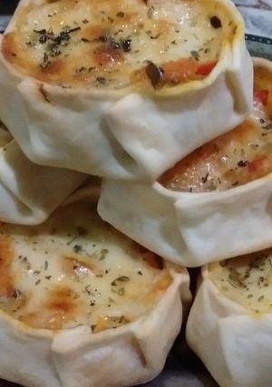 Una foto de Canastitas de acelga y ricota