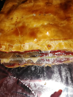 Una foto de Empanada de champiñones