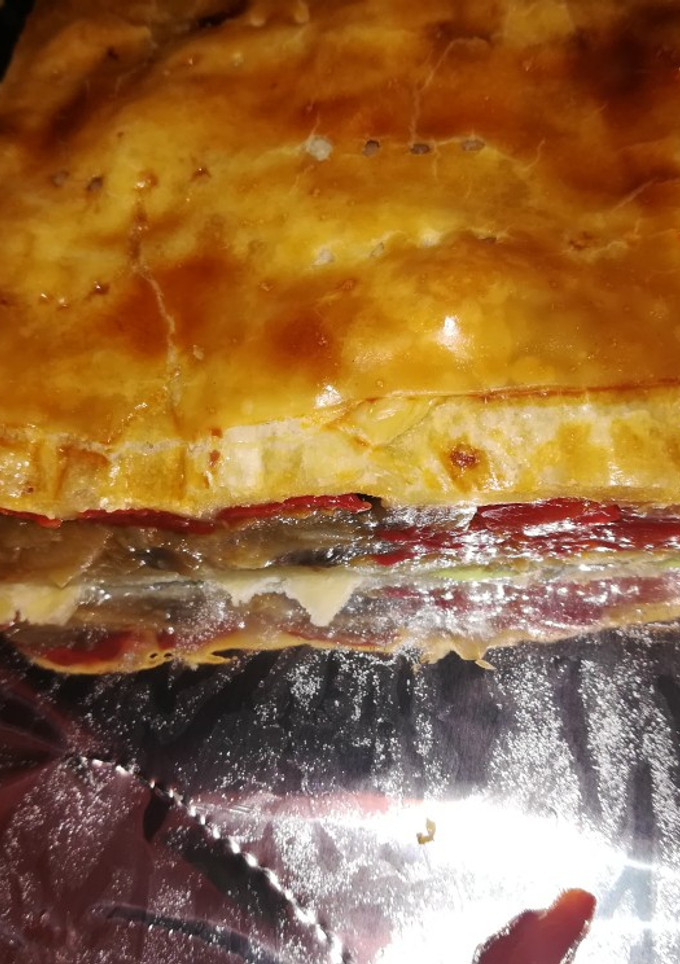 Una foto de Empanada de champiñones