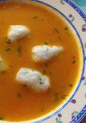 A picture of Carrot Soup with Grießklöchen (Semolina Dumplings).